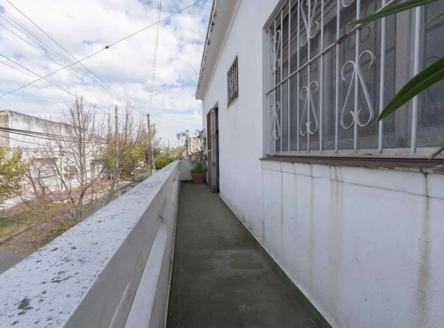 CASA CON DEPOSITO/LOCAL EN VENTA en SARANDI 5
