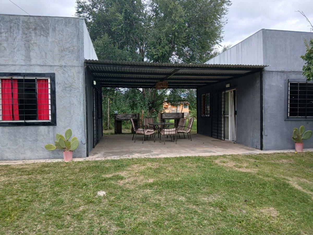 Foto de VENTA DOS CASAS 2 DORMITORIOS COSQUIN CORDOBA, imagen 3