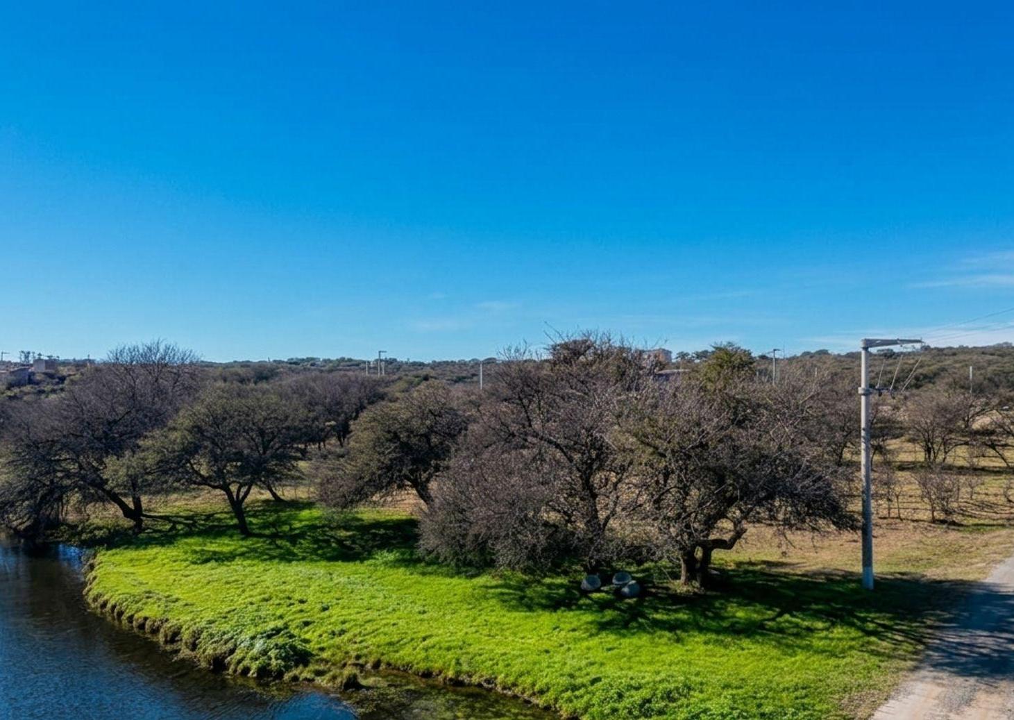 Foto de Venta lote premium 2.800m2 sobre río, Calamuchita, imagen 2
