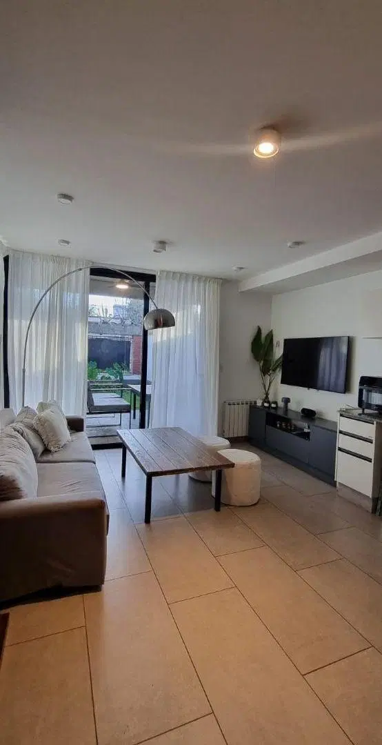 Departemento planta baja con jardin 8