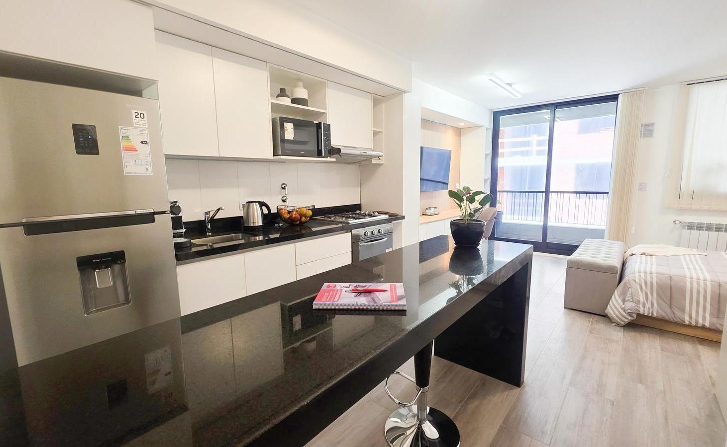 VENTA - Departamento de 2 dormitorios con patio y SUM. Financiación. Martin - Rosario