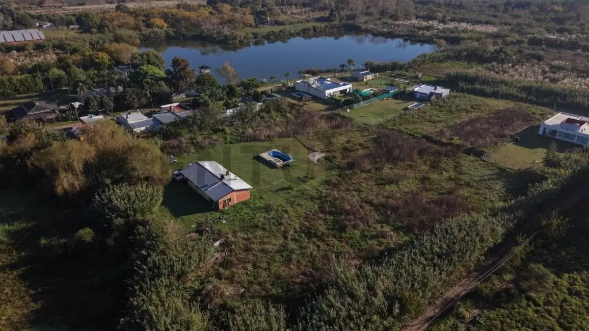 LOTE CON CASA A LA VENTA, RUTA 15 BERISSO 4