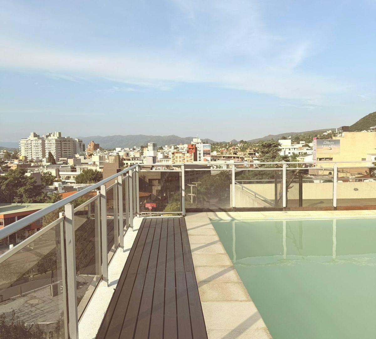 Foto de VENTA DEPARTAMENTO 1 DORMITORIO CON PATIO Y COCHERA | CARLOS PAZ, imagen 1