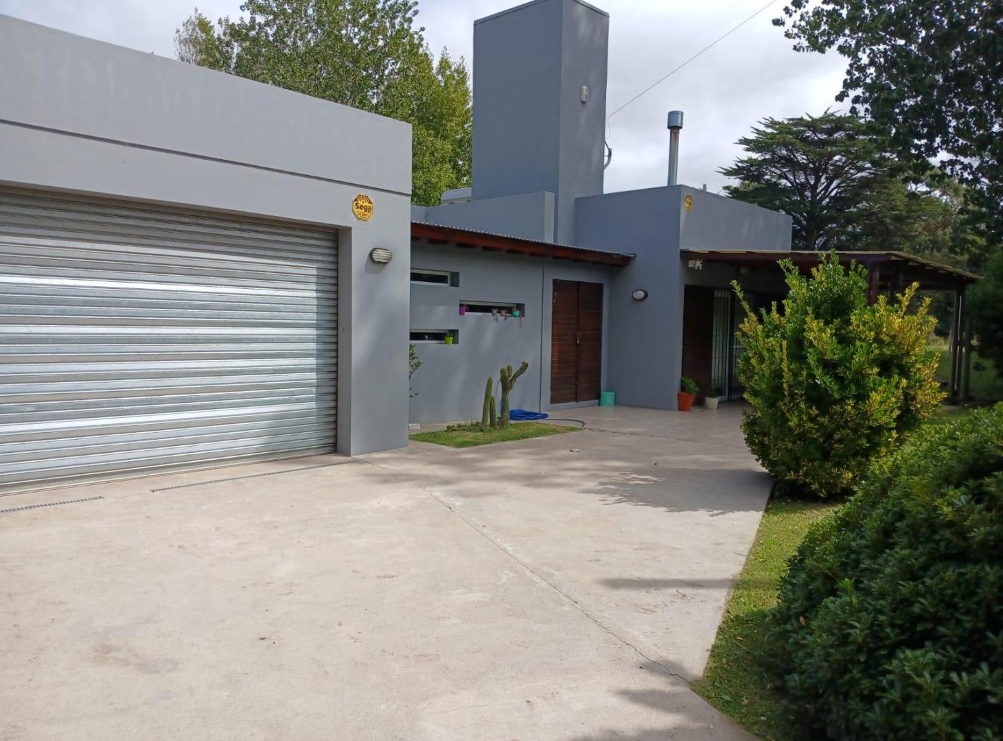 SE VENDE CASA CUATRO AMBIENTES MAS QUINCHO COMPLETO LOTE 1000MTS