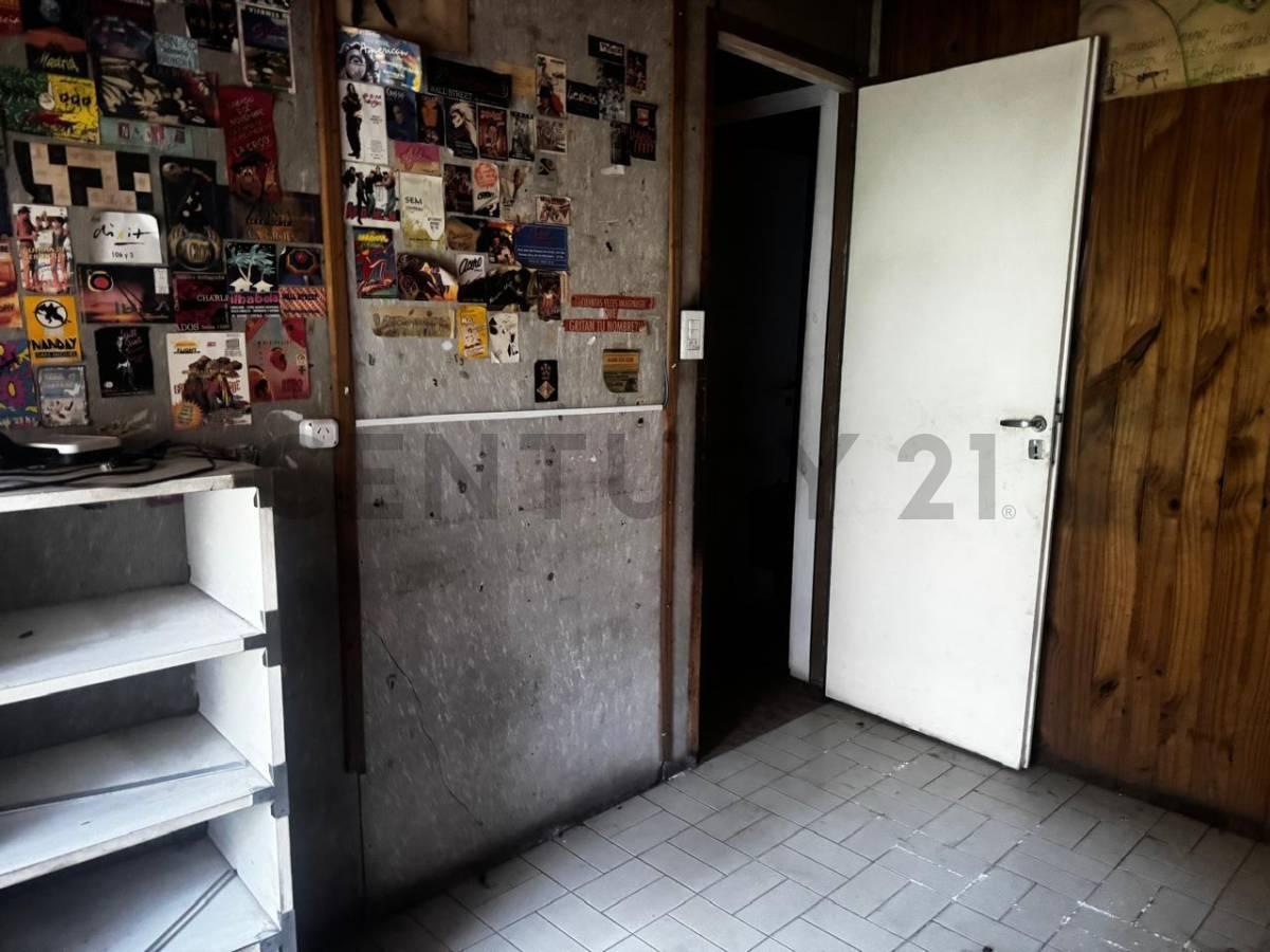 Foto de VENTA LOTE ITUZAINGO CON CASA A REFACCIONAR, imagen 3