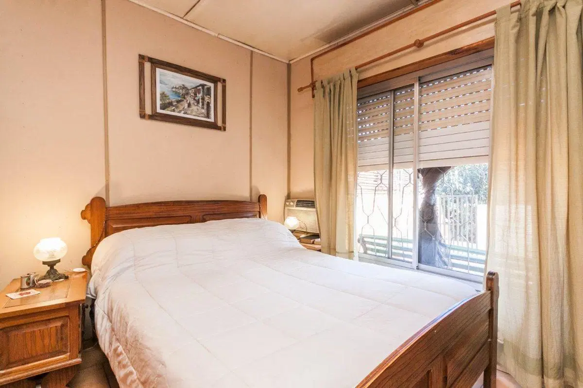 VENTA CASA MULTIFAMILIAR CON COCHERA LANUS ESTE 8