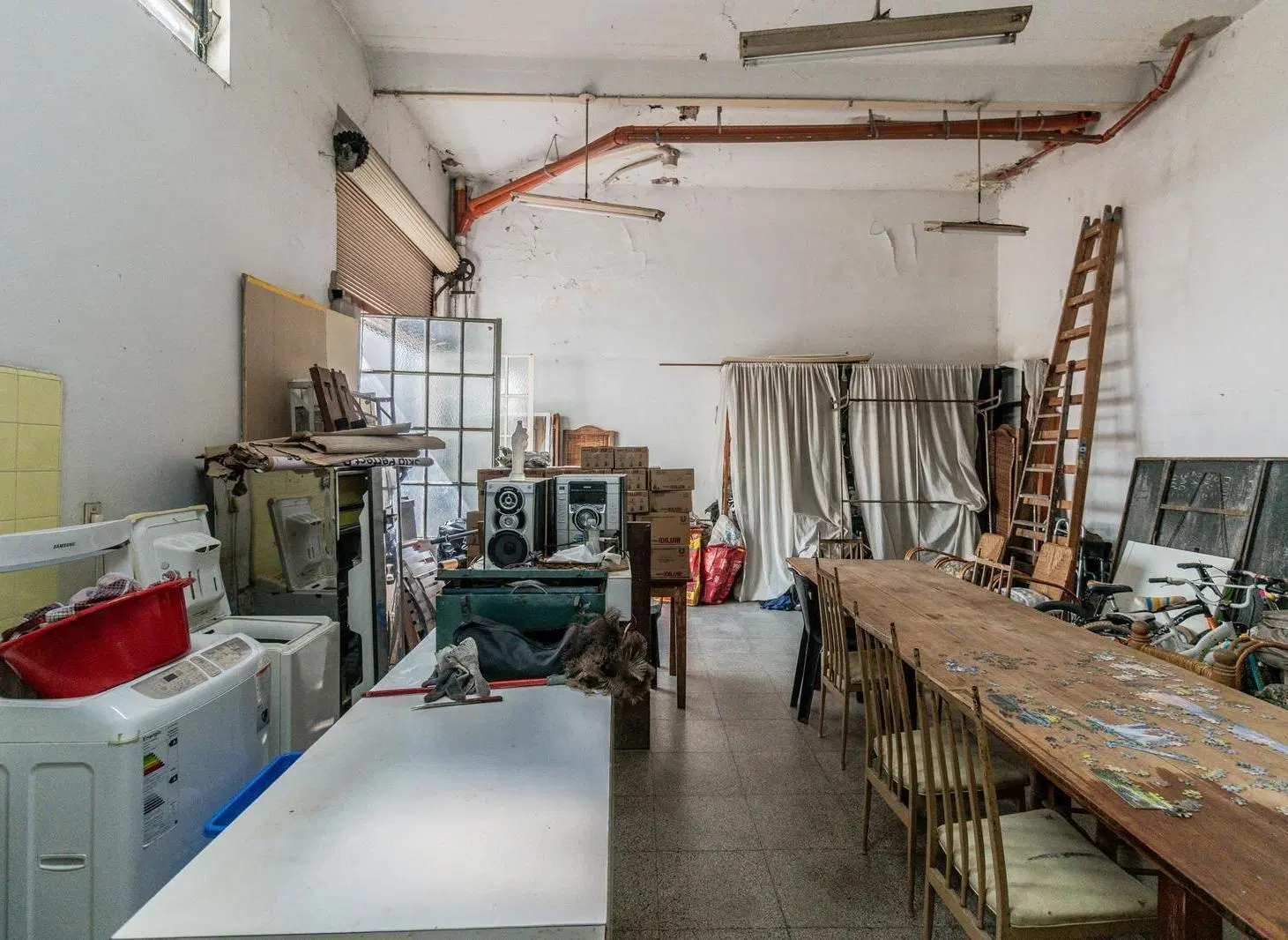 Casa con departamento  mas  gran depósito y cocheras en lote propio. Excelente zona!! 2