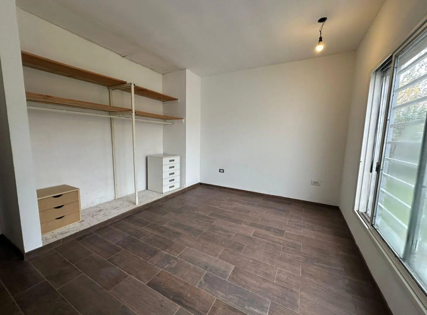 Casa de un dormitorio con parque 1
