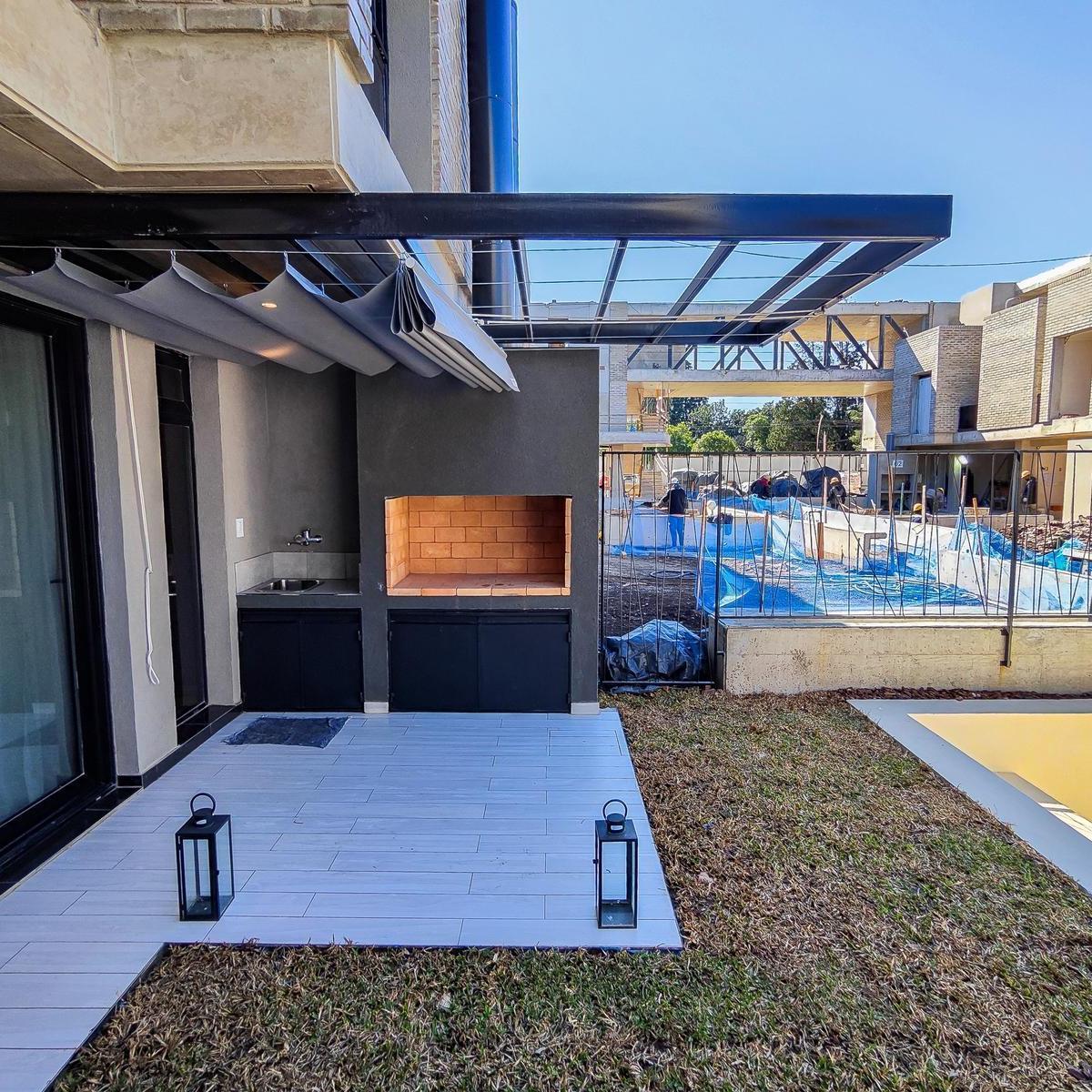 Casa en condominio en fisherton a estrenar 3 dormitorios pileta terraza patio parrillero