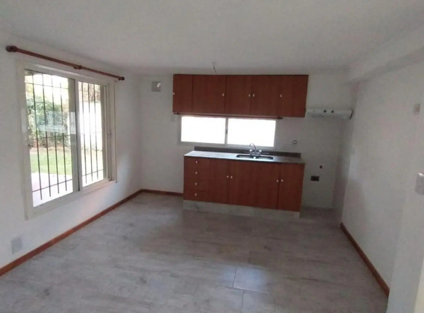 VENTA DE CASA DE DOS DORMITORIOS EN FUNES CENTRO 4