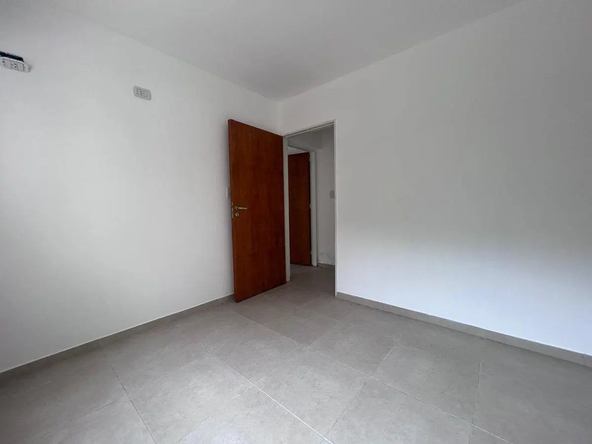 CASA 2 DORMITORIOS CON PATIO A ESTRENAR 5