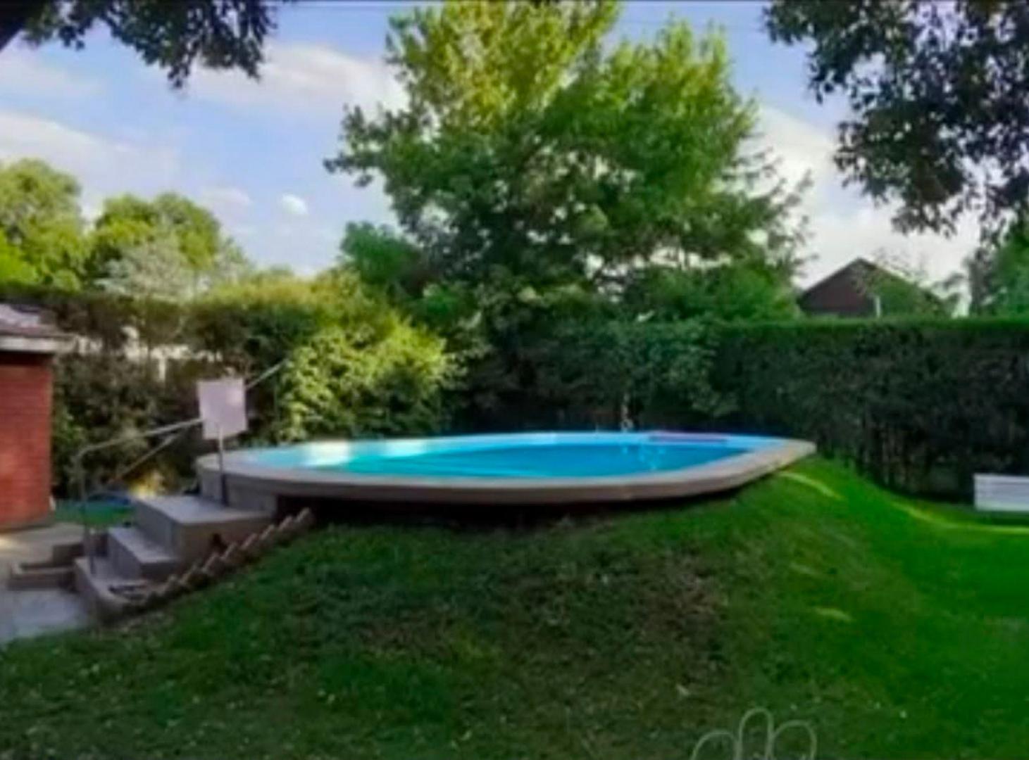 Foto de VENTA CASA 2 DORMITORIOS FUNES CON PILETA, imagen 3