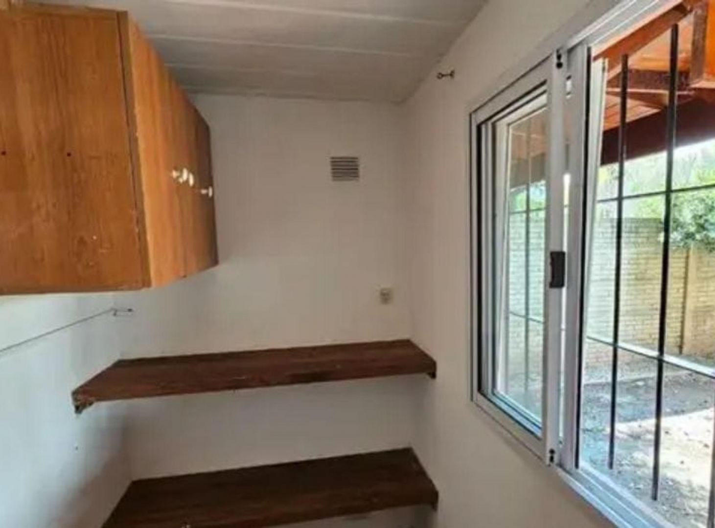 Foto de VENTA DE CASA DE DOS DORMITORIOS EN FUNES CENTRO, imagen 5