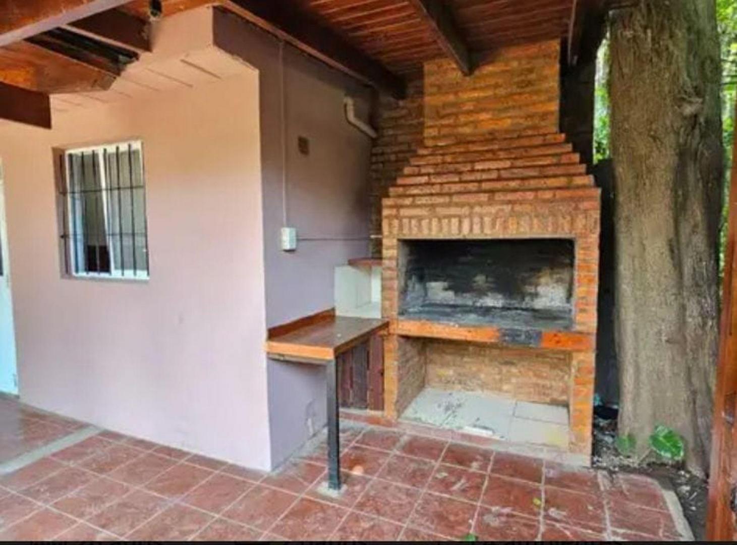 Foto de VENTA DE CASA DE DOS DORMITORIOS EN FUNES CENTRO, imagen 3
