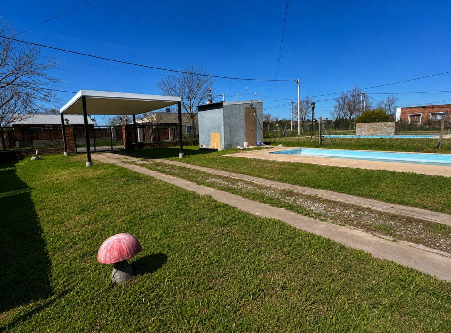 Foto de VENTA: CASA DE 2 DORMITORIOS Y PILETA EN ROLDAN, imagen 2