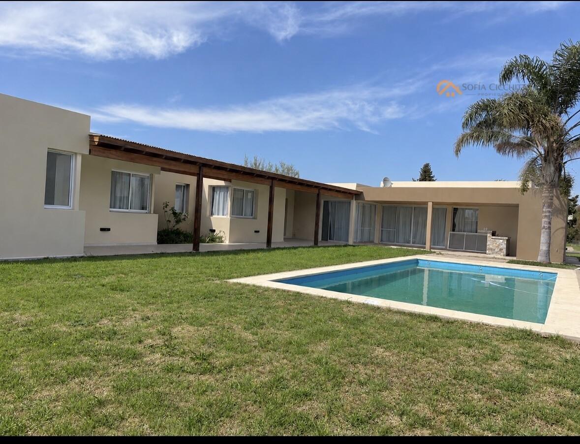 Foto de EN VENTA - PUERTO ROLDÁN BARRIO CERRADO- 3 DORMIT-4 BAÑOS- PISCINA, imagen 2