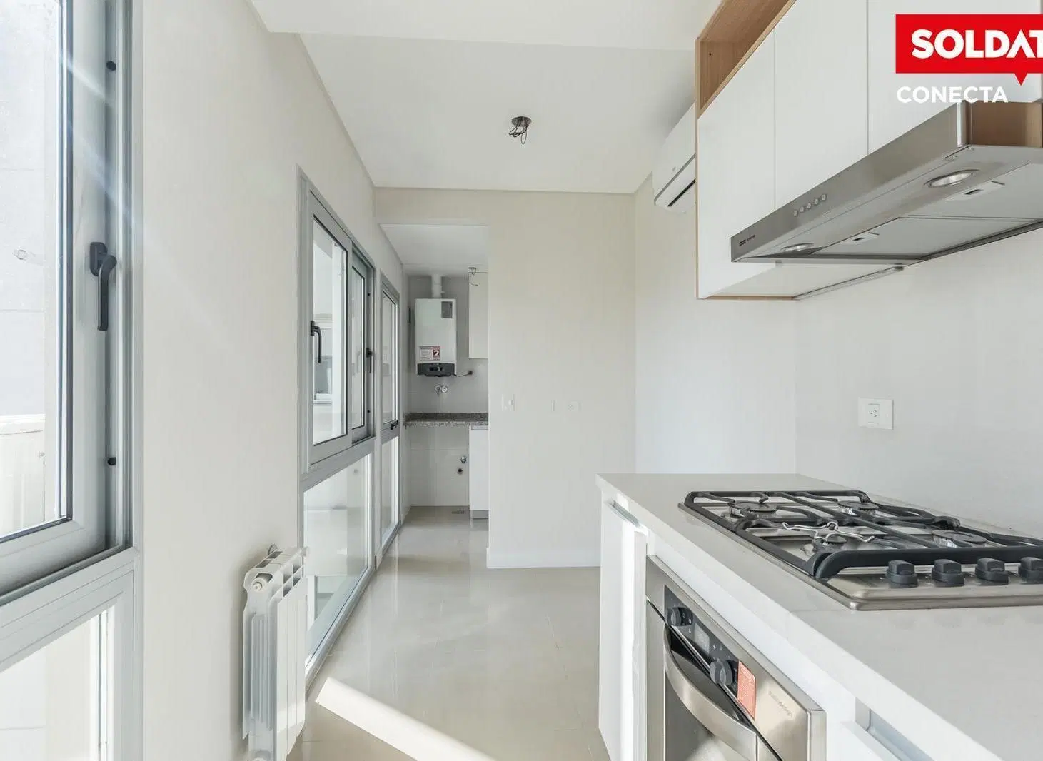 Departamento en  venta de 3 ambientes al frente con balcón y patio en Caballito 4