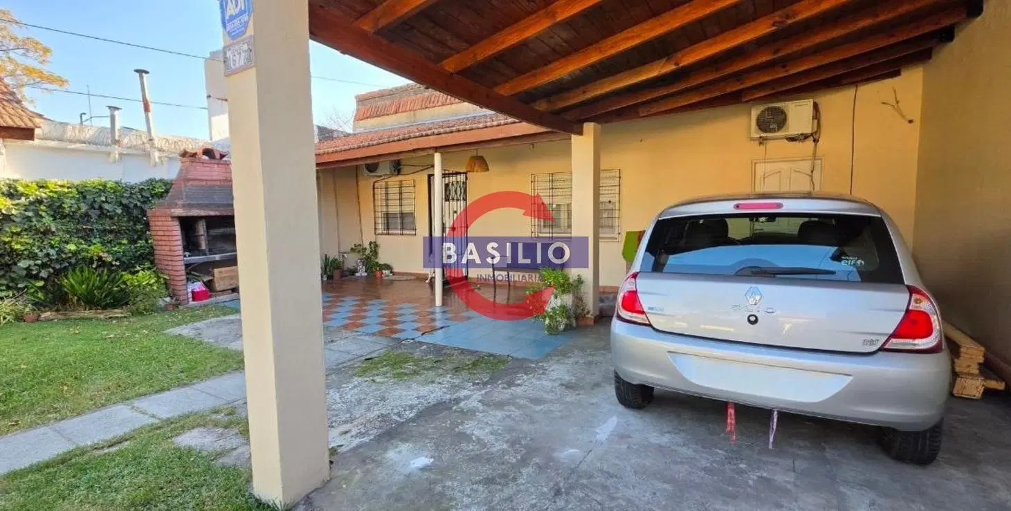 CASA EN VENTA EN LOTE PROPIO CON JARDÍN, COCHERA Y PARRILLA EN BOULOGNE 5