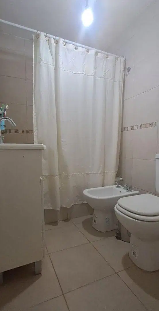 DEPARTAMENTO PLANTA BAJA, CON COCHERA 4
