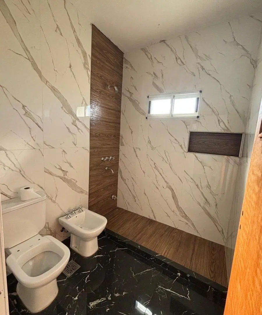 VENTA CASA A ESTRENAR 2 DORMITORIOS EN ROLDAN 5