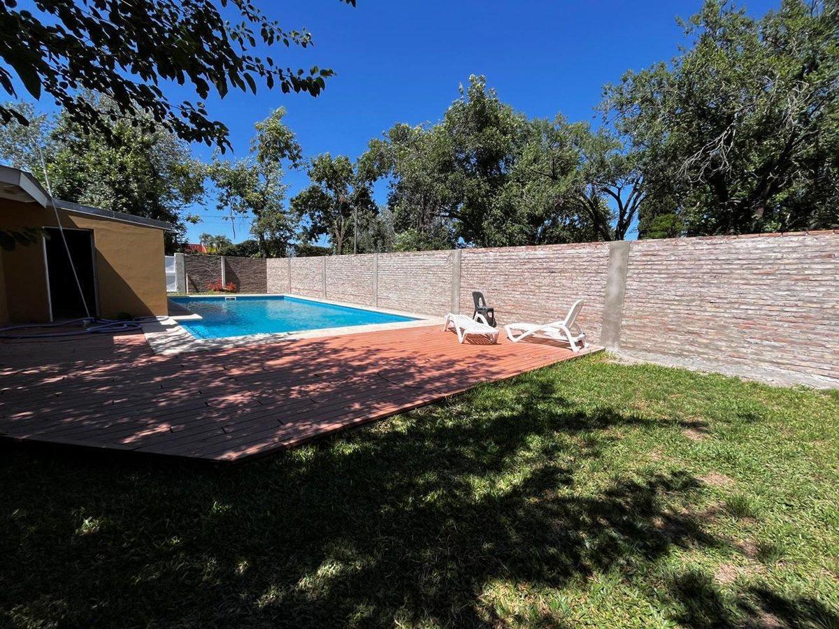 VENTA QUINCHO EN FUNES CON PILETA 1 DORMITORIO