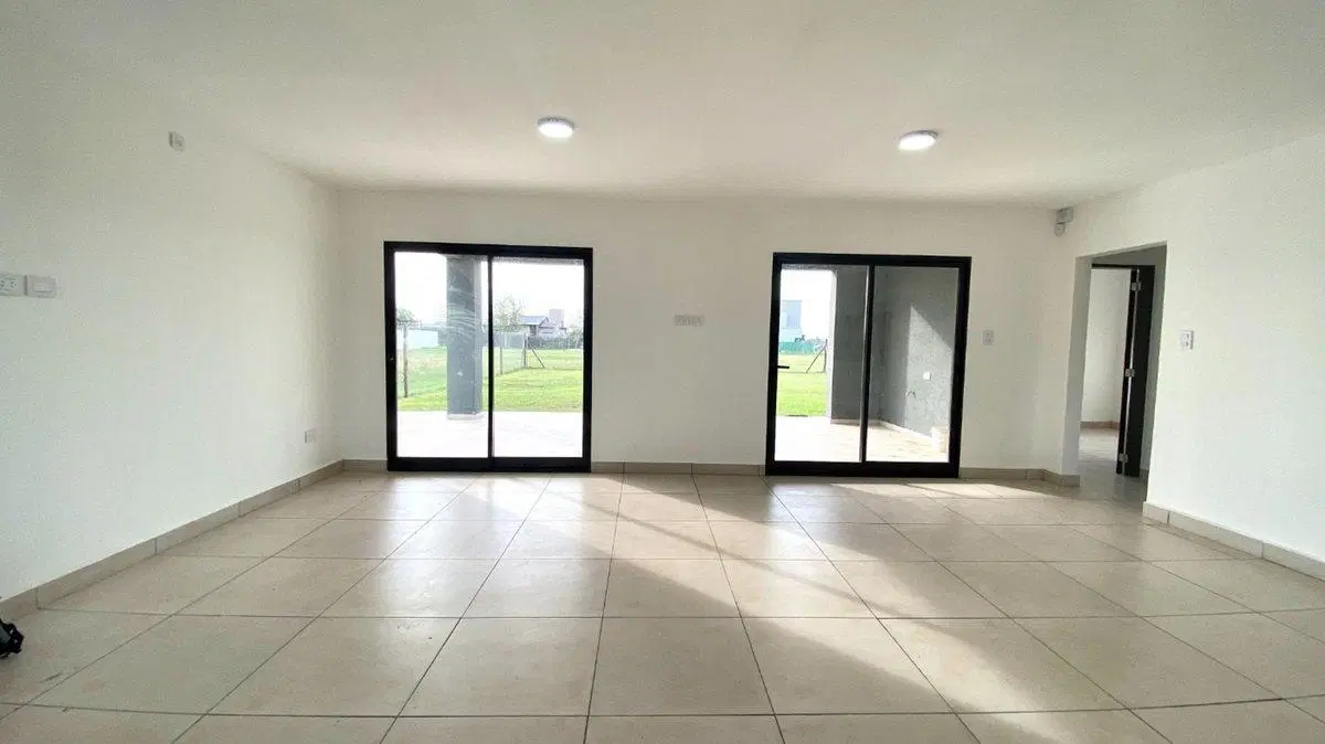 VENTA CASA DE 2 DORMITORIOS FUNES NORTE CREDITO 4