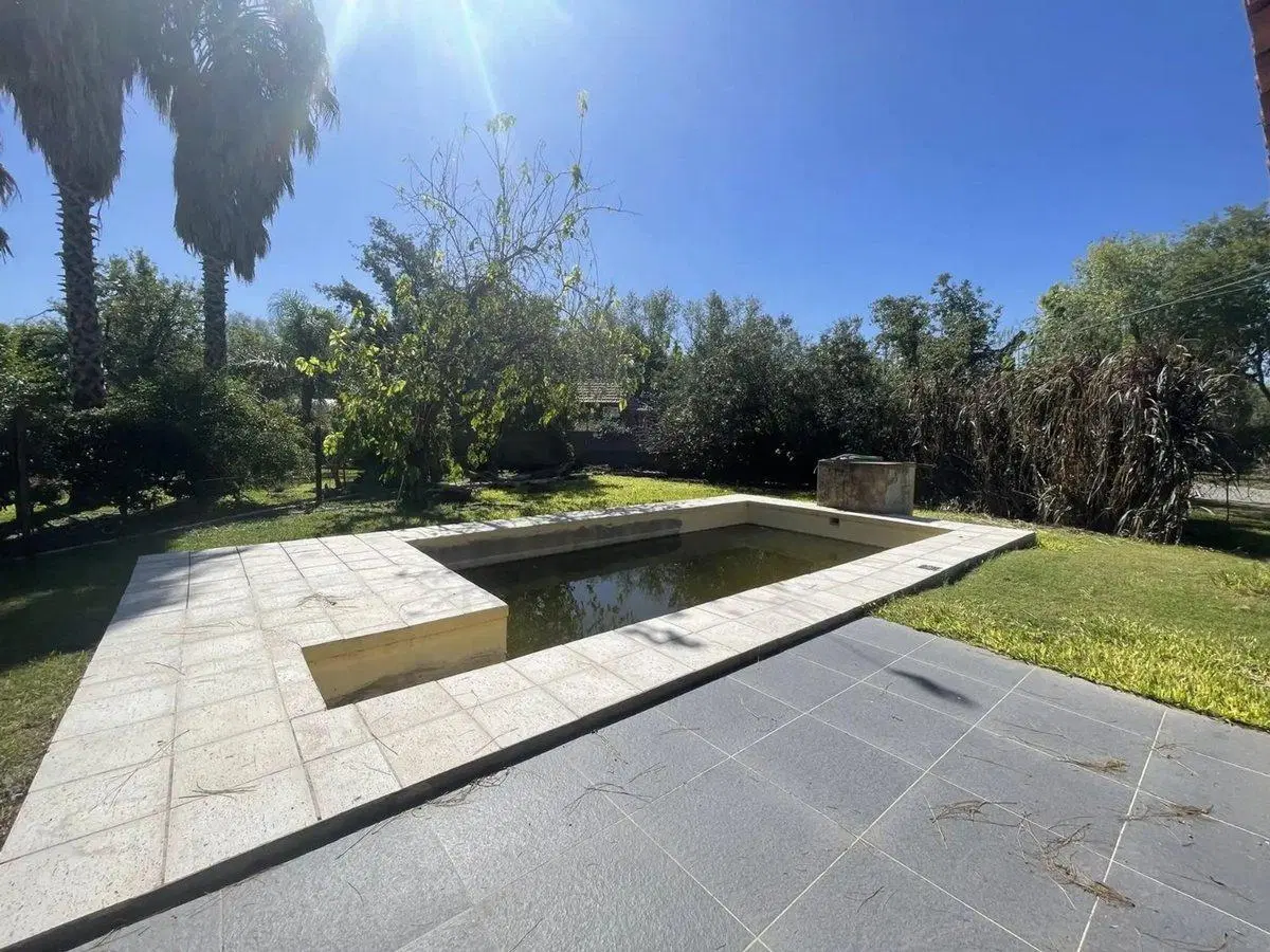 VENTA LOTE CON EDIFICACION Y PILETA FUNES SANTA FE 4