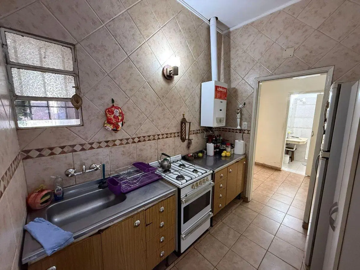 VENTA CASA 2 DORMITORIOS + COMODIN, PATIO Y PILETA 4