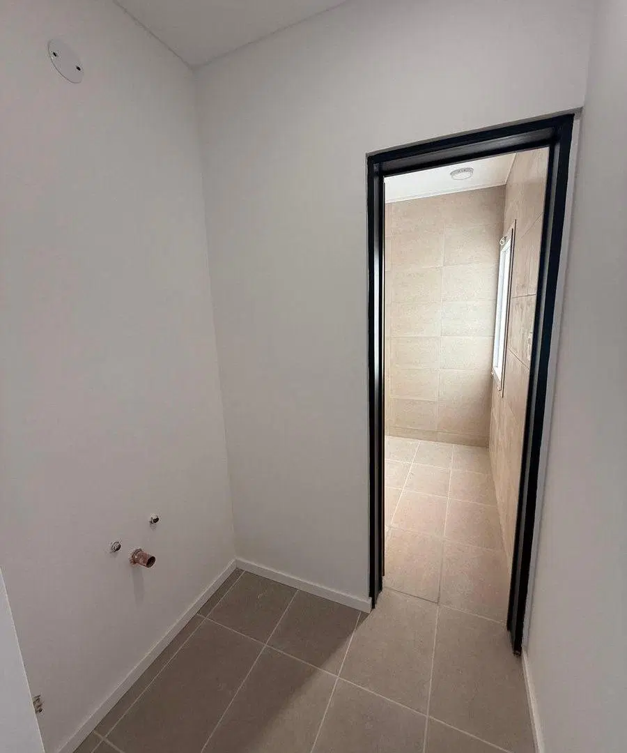 VENTA CASA DUPLEX 2 DORMITORIOS CON PATIO ROLDAN 3