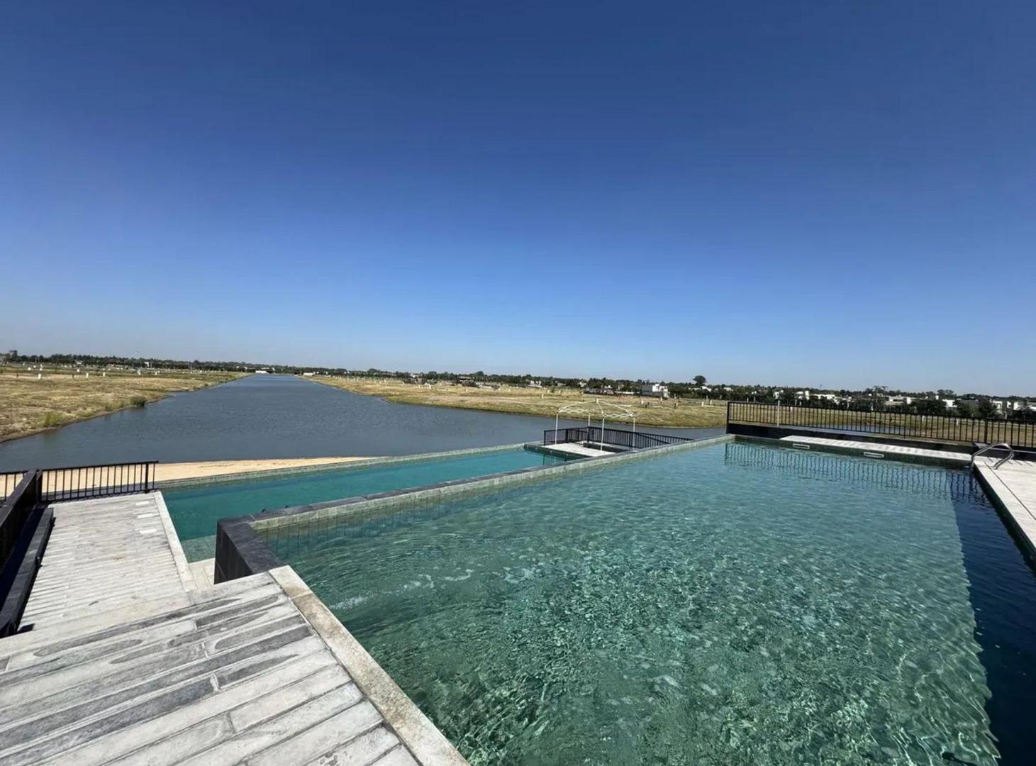 Foto de VENTA DE LOTES EN FUNES LAKES, imagen 3
