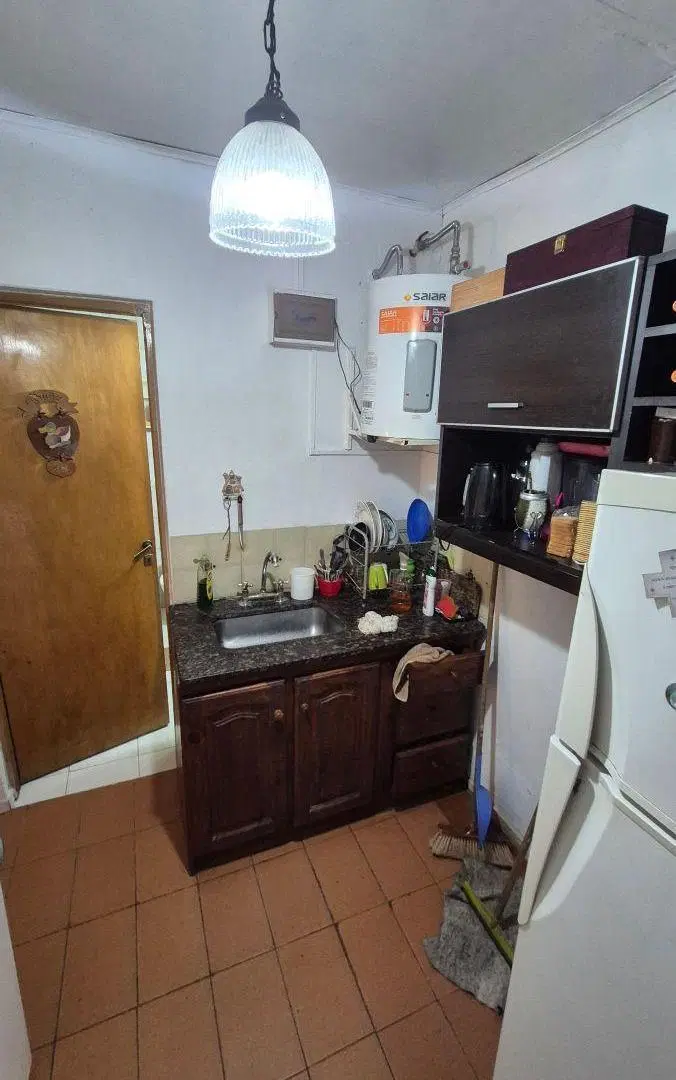 VENTA DE DPTO TIPO CASA, 2 LOCALES, 2 DEPOSITOS Y COCHERAS. SOBRE 2 LOTES DE 8.66X26.22. 3