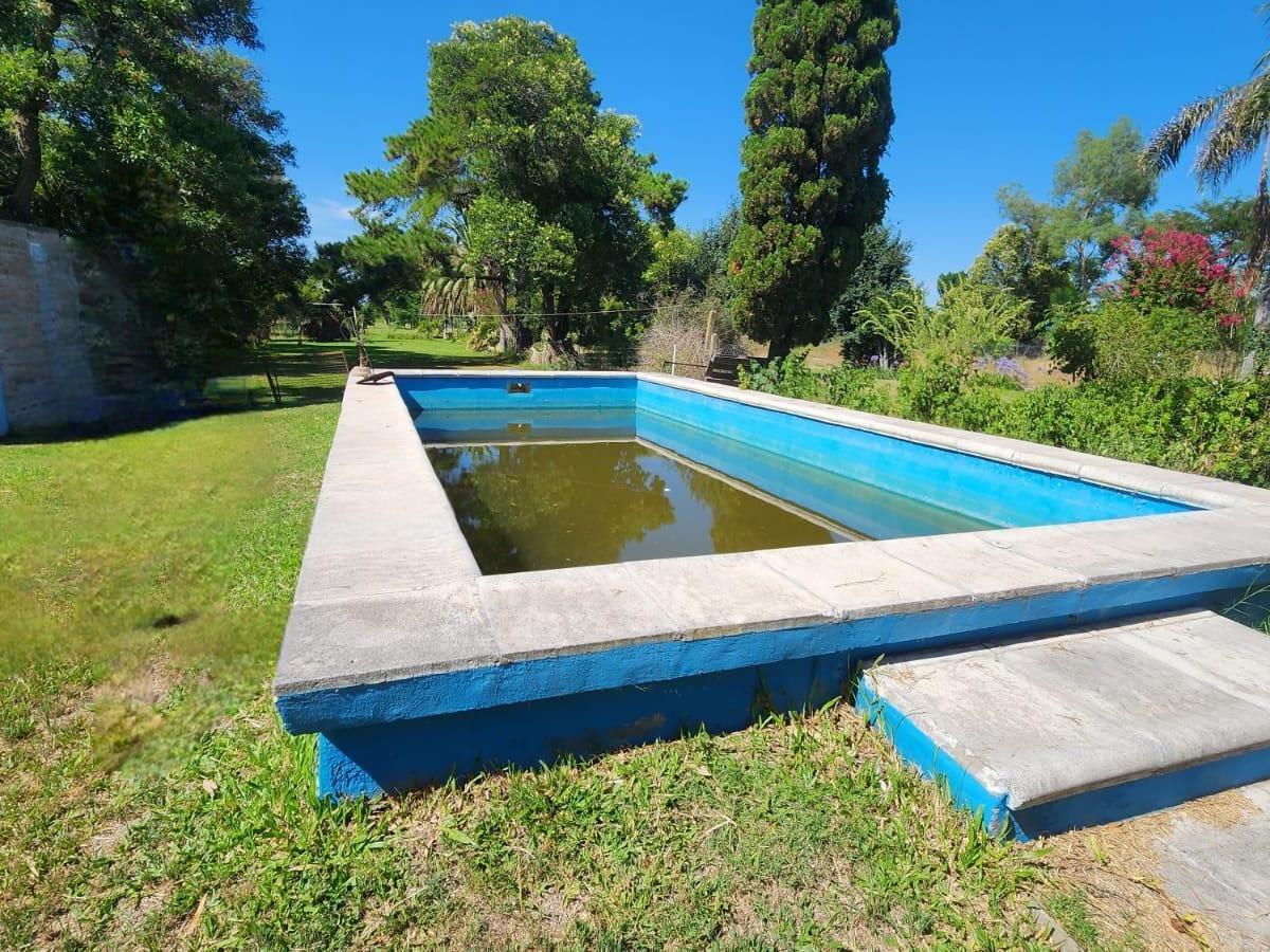 Oportunidad Casa Quinta en Barrio Caima en Excelente Estado 2