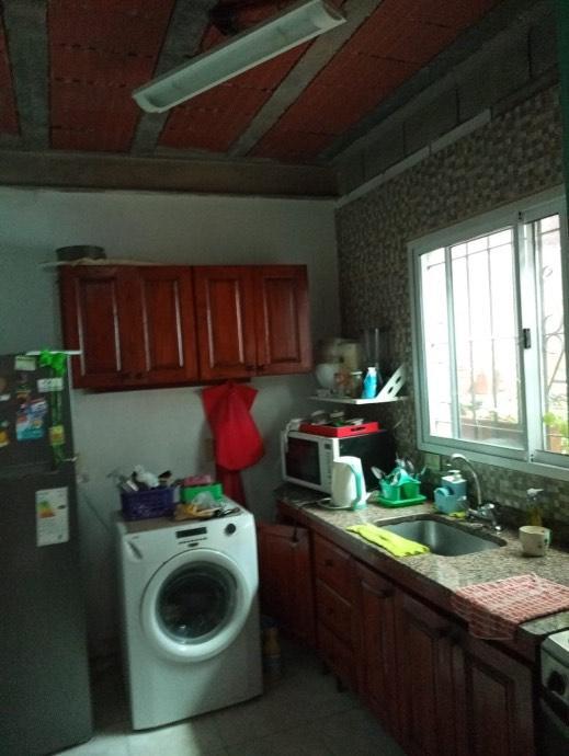 Salón con Vivienda 3