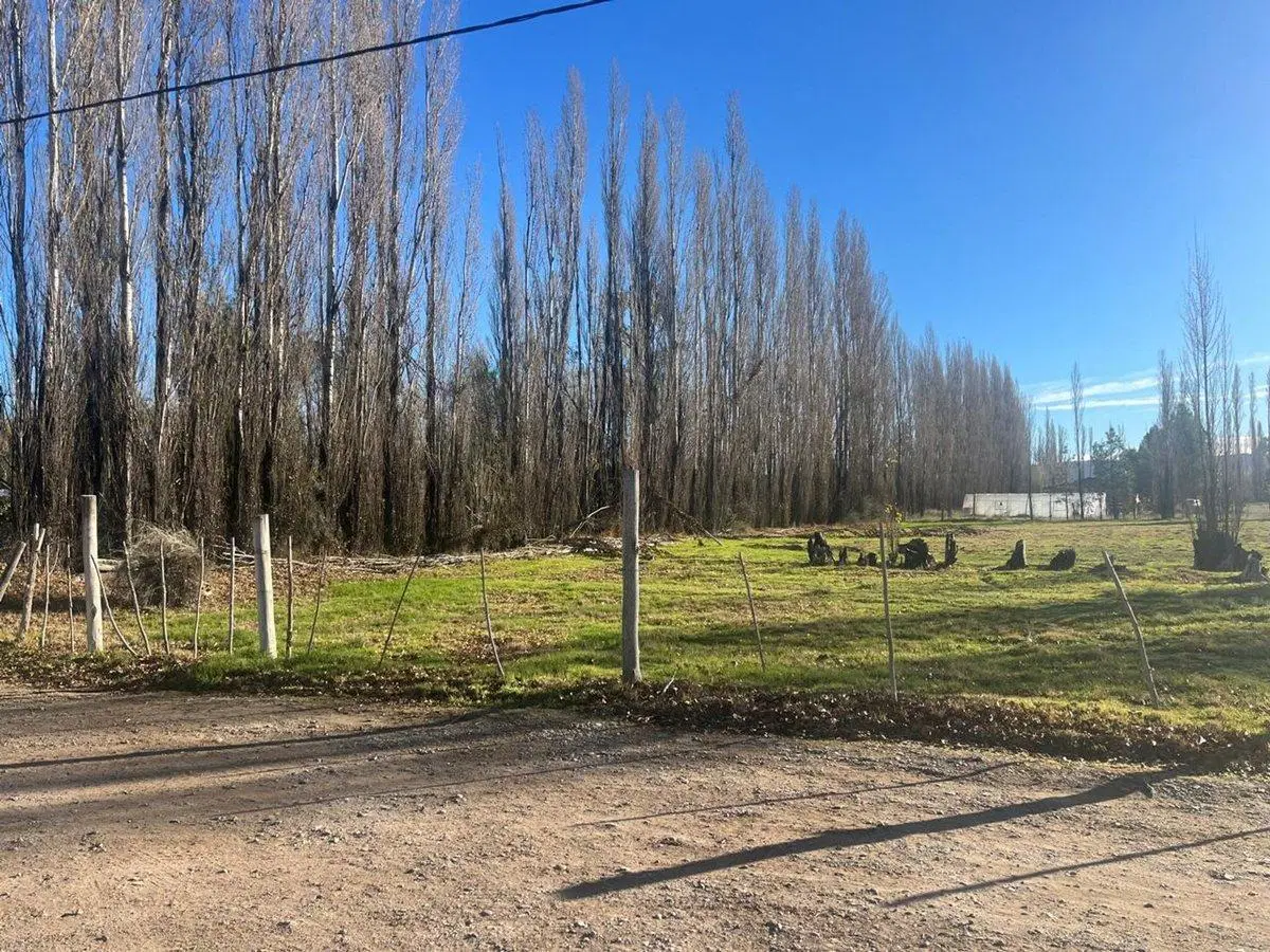 VENTA DE TERRENO EN EXCLUSIVO BARRIO - PLOTTIER 5