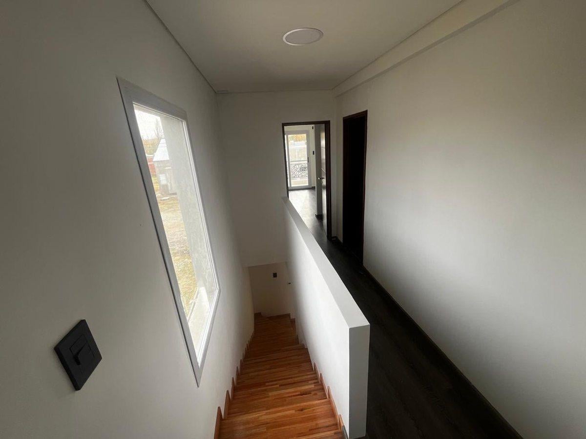 Foto de VENTA DUPLEX 3 DORMITORIOS B°LA CASONA ll PLOTTIER, imagen 2