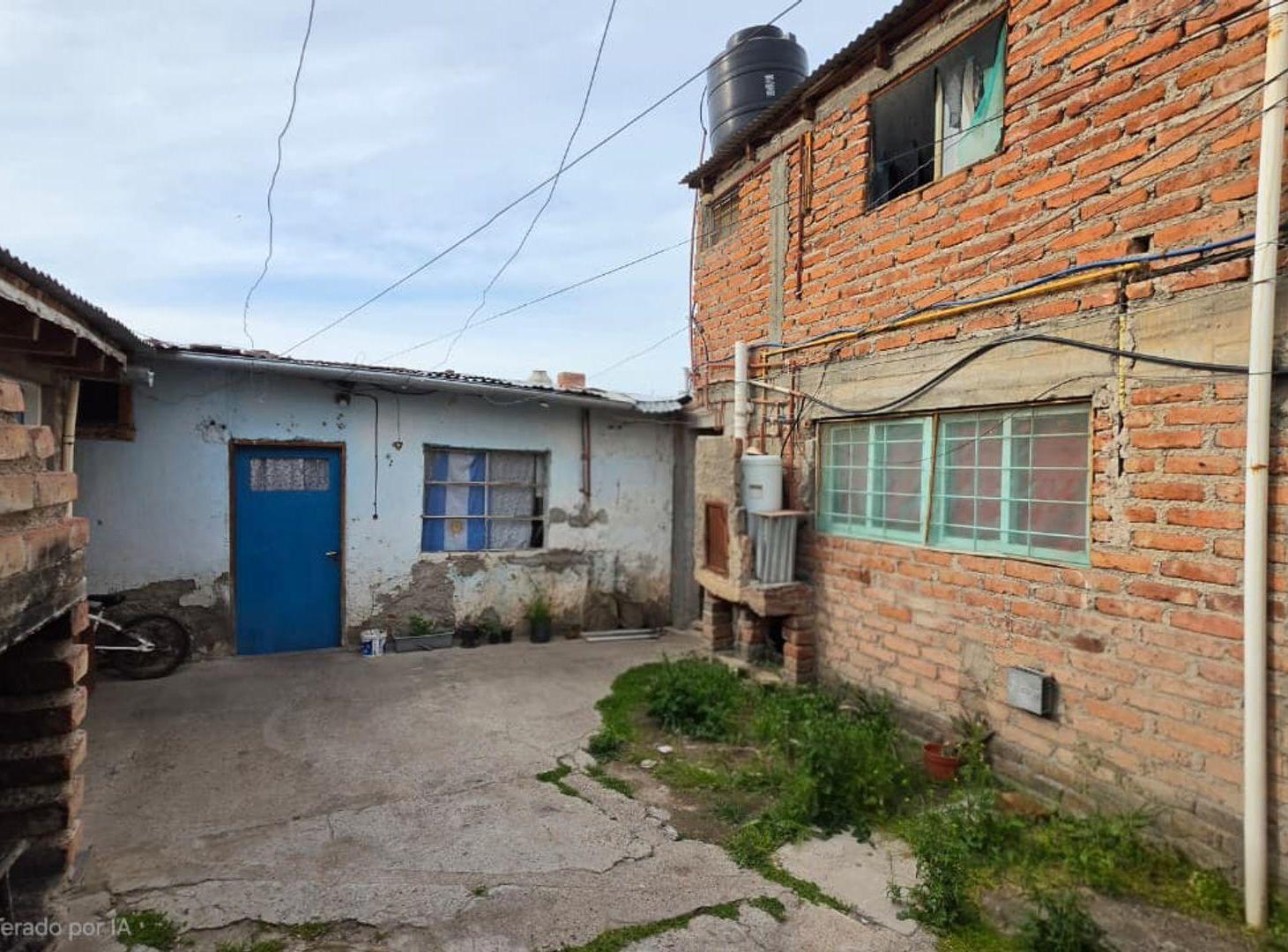 Foto de VENTA CASA + 5 DEPARTAMENTOS - CENTRO PLOTTIER, imagen 4