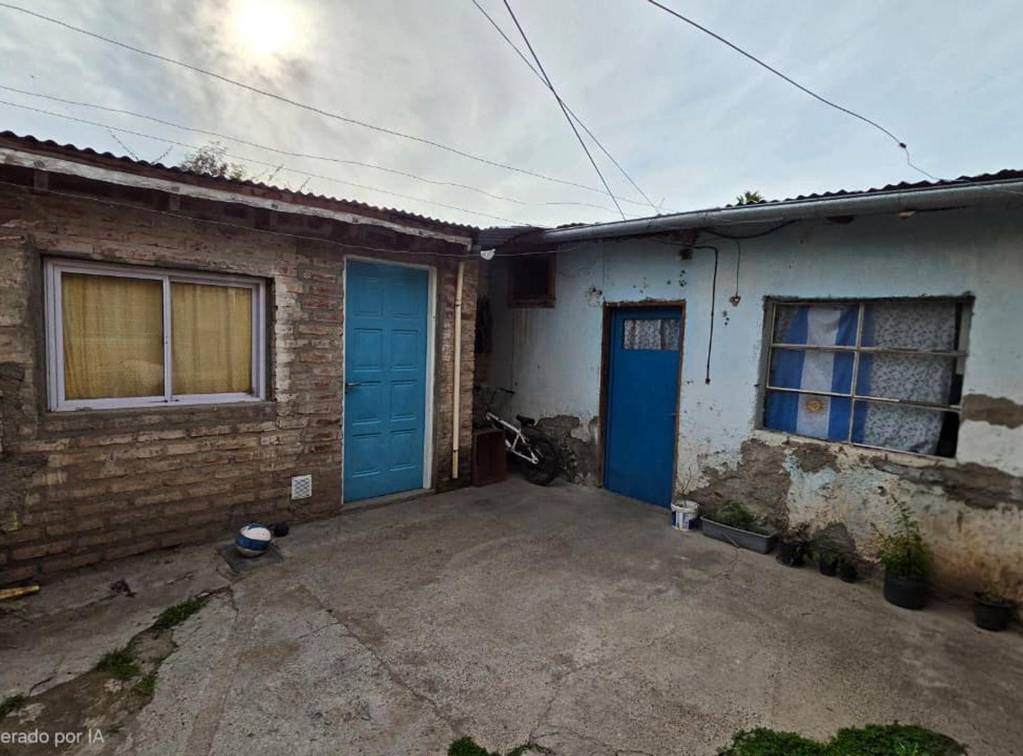 Foto de VENTA CASA + 5 DEPARTAMENTOS - CENTRO PLOTTIER, imagen 1