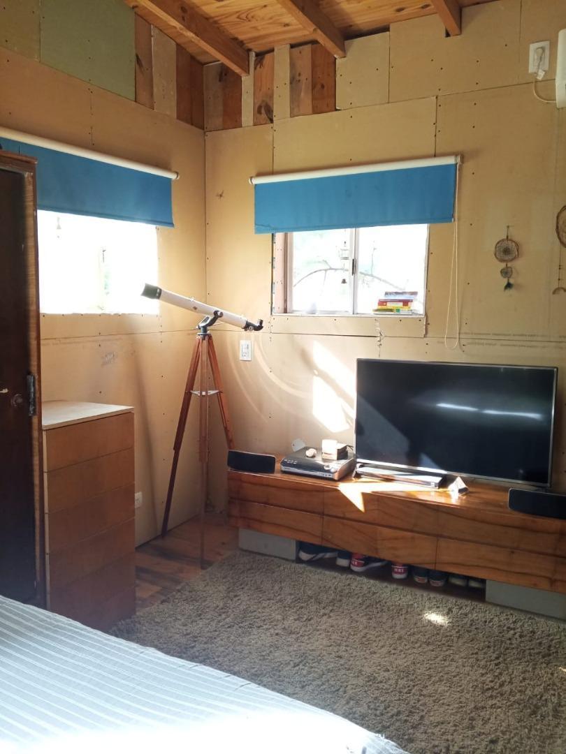 Foto de Casa estilo cabaña, construida en sistema woodframe., imagen 5