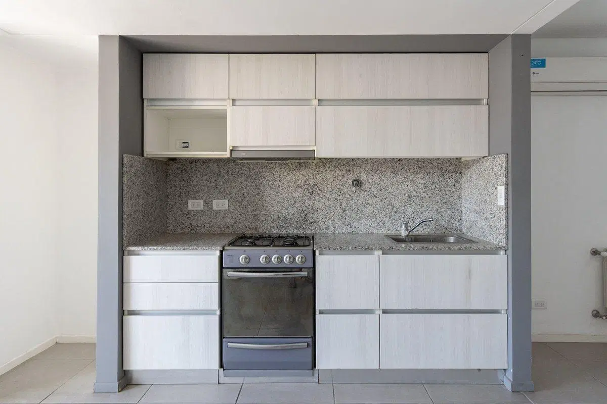 DEPARTAMENTO VENTA ITUZAINGO 3 AMB COCHERA JARDIN 2