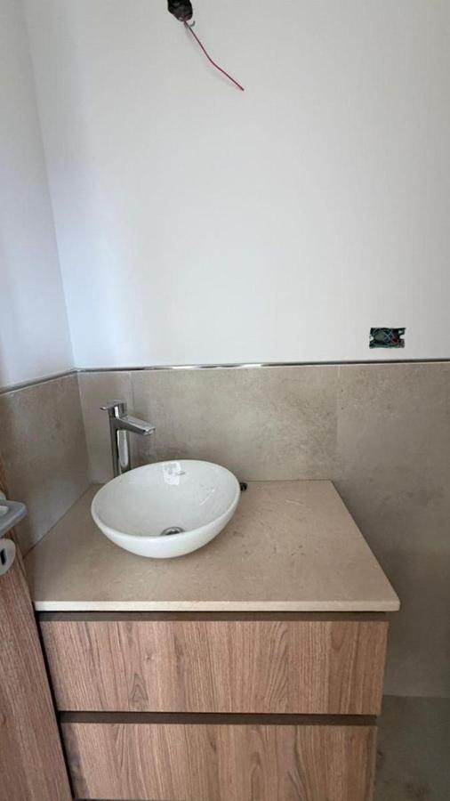 Foto de VENTA TRIPLEX DOS DORMITORIOS A ESTRENAR BAHIA BLANCA, imagen 3