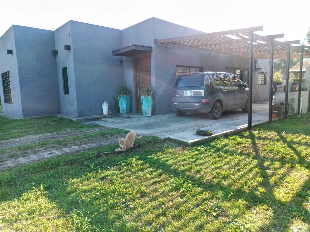 Foto de Venta casa 4 ambientes con pileta en barrio Tipas Blancas - Yei Porá, imagen 1
