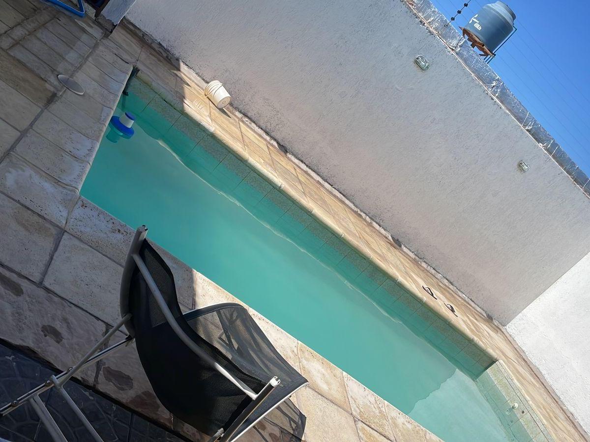 Casa con Quincho y Piscina 4