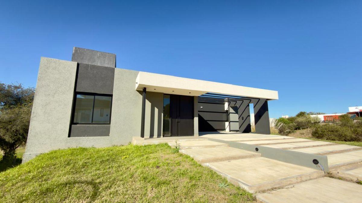 EN VENTA EXCLUSIVA CASA EN LAS CAÑITAS BARRIO PRIVADO – MALAGUEÑO, 3 Dorm. con fondo a espacio verde