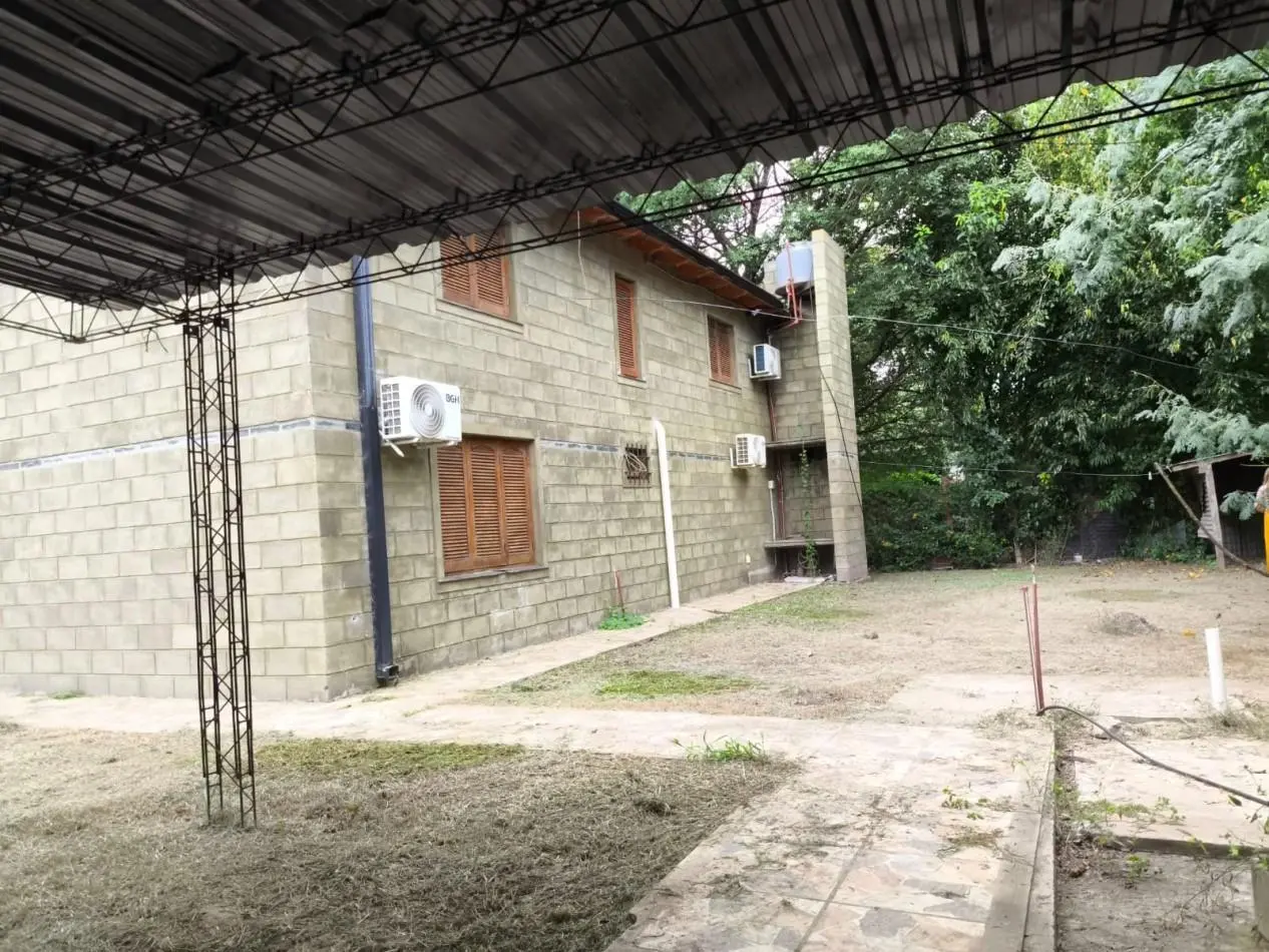CASA CON PISCINA Y ESPACIO VERDE, SAUCE VIEJO 4