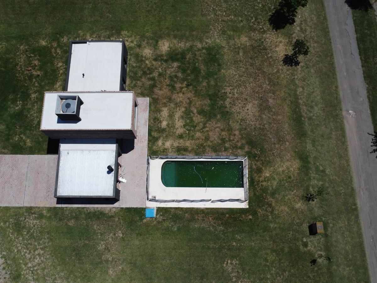 CASA VENTA LUJAN BARRIO CERRADO LOS JUNCOS 4 AMBIENTES