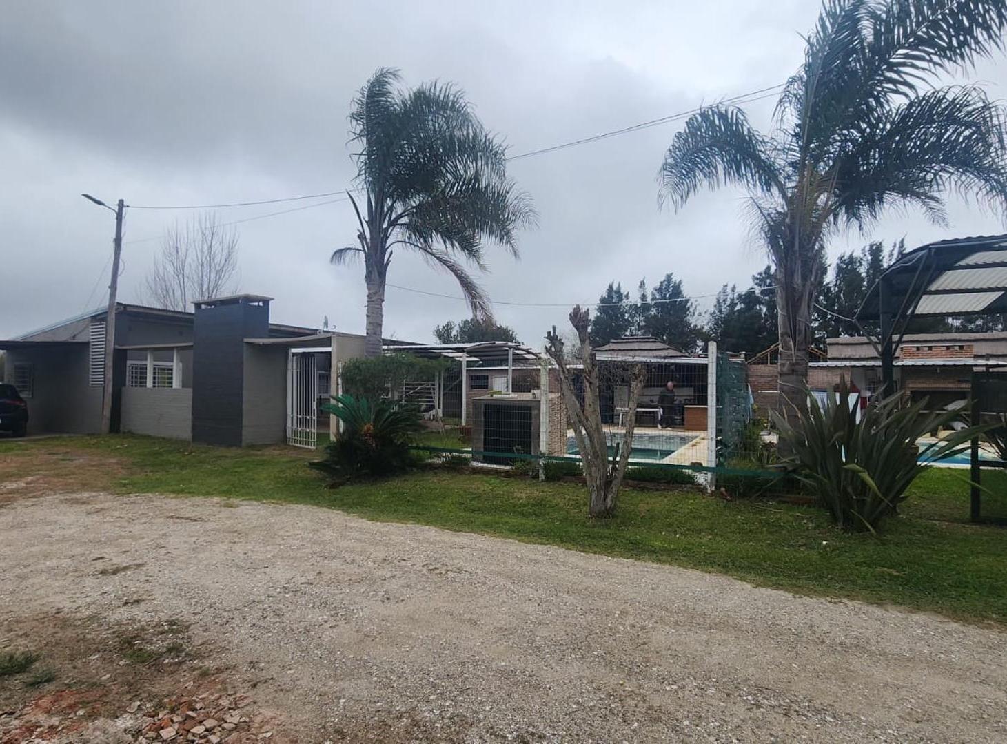 Foto de CASA DE 3 DORMITORIOS Y 2 BOUNGALOWS EN VENTA EN CAIMA, imagen 3