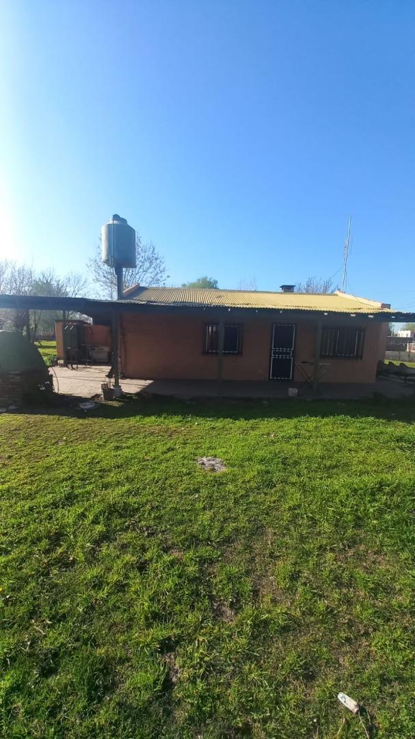 Terreno con casa y galpón en venta - La Capilla. Florencio V