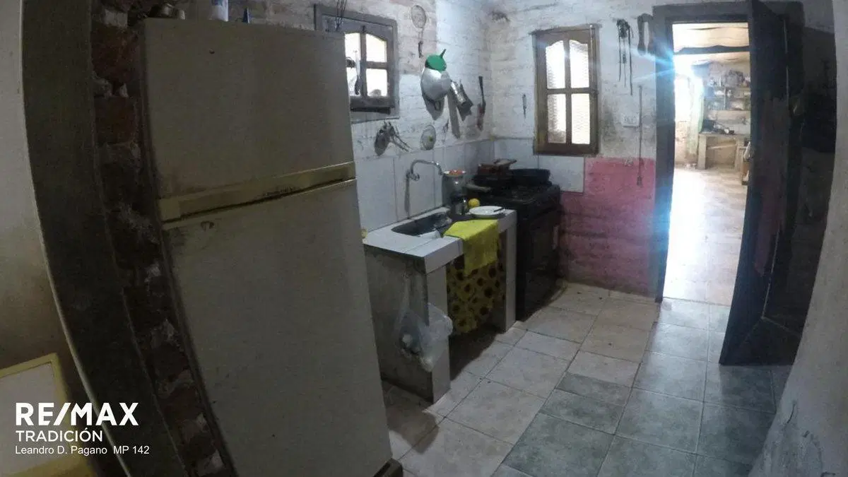 TERRENO CON CONSTRUCCION EN VENTA ZONA ESTUDIANTES 4