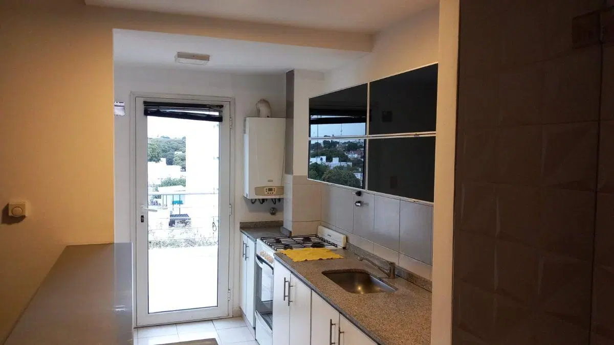 DEPARTAMENTO DE UN DORMITORIO Y MEDIO EDIFICIO CON PILETA 4
