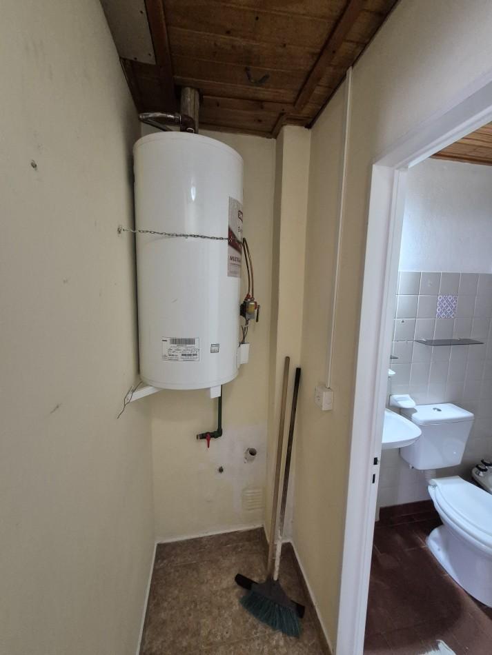 Casa en Esquina con Quincho/cochera en Barrio 400 Viviendas 5